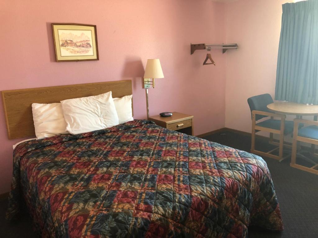 Executive Inn - Habitación De La Reina