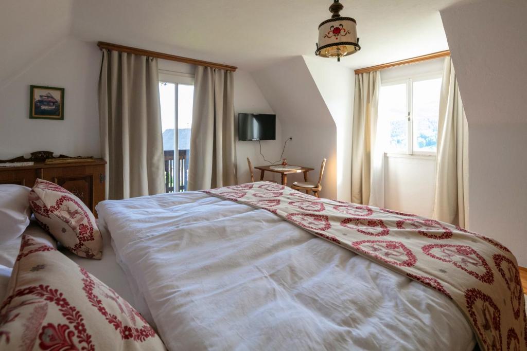 Postel nebo postele na pokoji v ubytování Haus Annerl