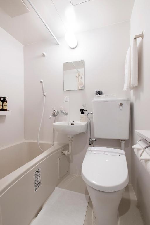 Koupelna v ubytování Hotel Kojan