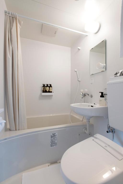 Koupelna v ubytování Hotel Kojan