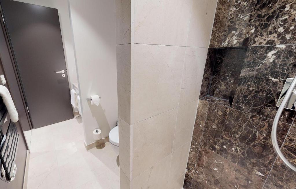 Koupelna v ubytování White Pearl Apartment 0.02