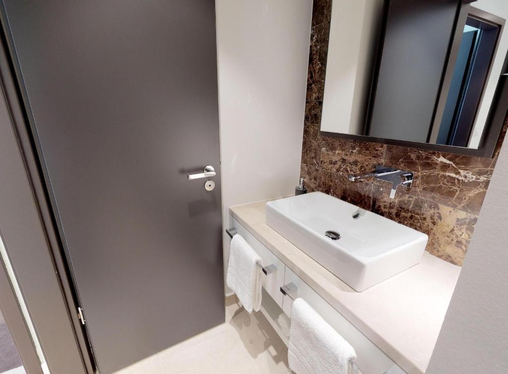 Koupelna v ubytování White Pearl Apartment 0.02