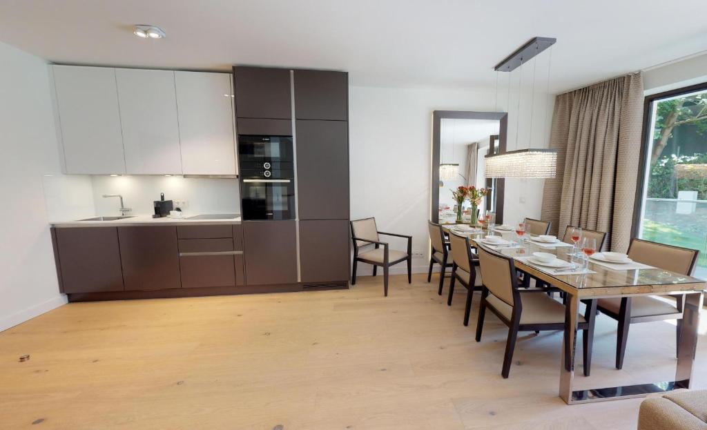 Kuchyň nebo kuchyňský kout v ubytování White Pearl Apartment 0.02