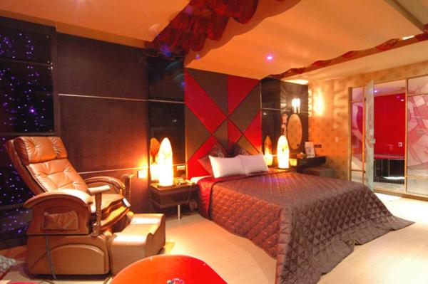 Postel nebo postele na pokoji v ubytování Zheng Yi Hotel & Motel I
