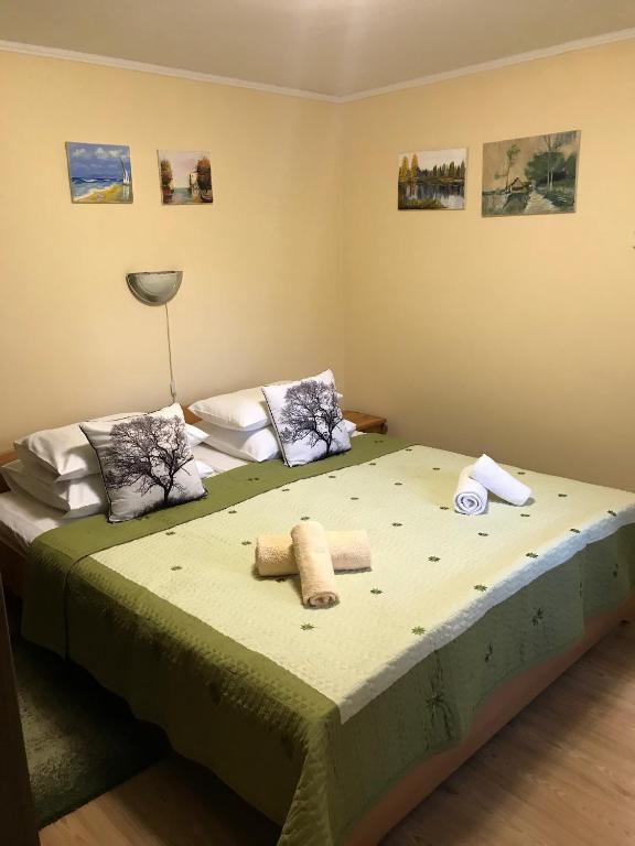 Postel nebo postele na pokoji v ubytování Altan Apartments