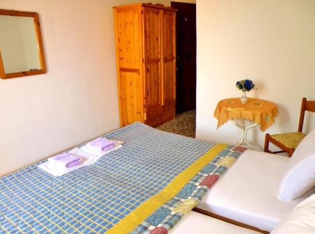 Postel nebo postele na pokoji v ubytování Pension Marina