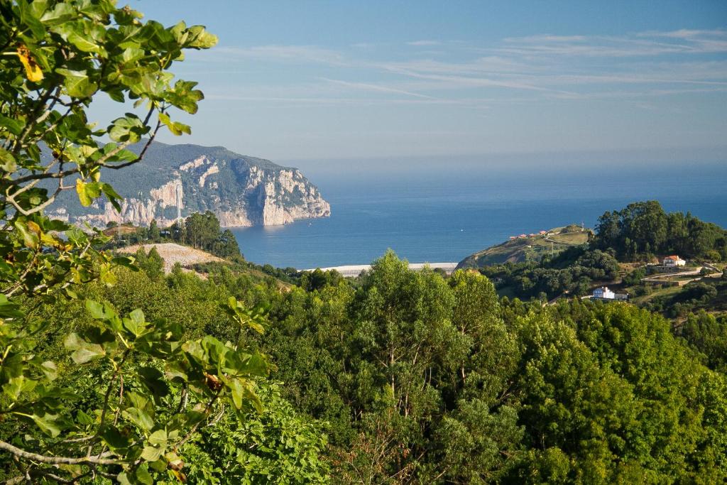 a view of the amalfi coast and the ocean at Posada El Nozal in Seña