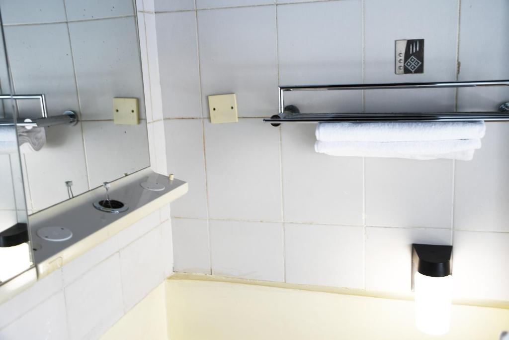 Koupelna v ubytování Jamia Central Hotel