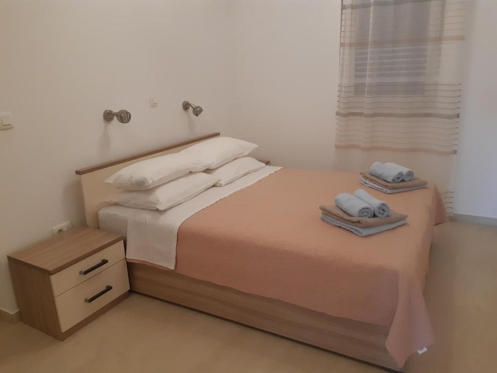 Posteľ alebo postele v izbe v ubytovaní Lorena
