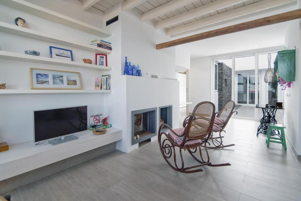 Televízia a/alebo spoločenská miestnosť v ubytovaní Flatguest - Castle Sea View