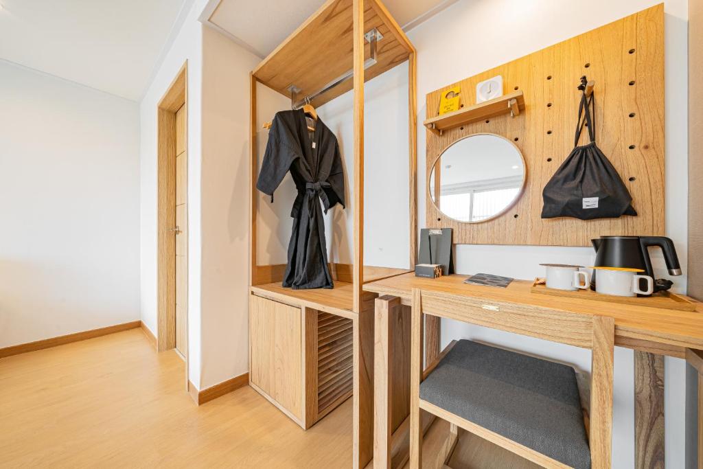 Kuchyň nebo kuchyňský kout v ubytování Heyy Seogwipo Hotel