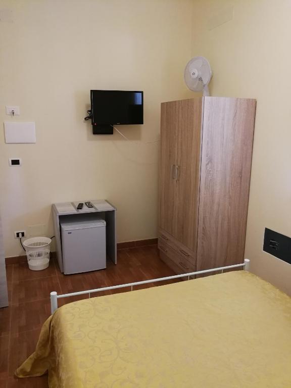 Postel nebo postele na pokoji v ubytování Villa Terra Nostra