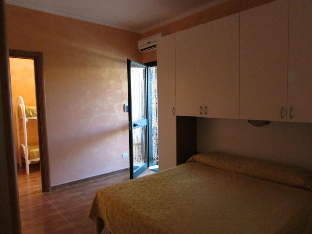 Postel nebo postele na pokoji v ubytování Villa Terra Nostra