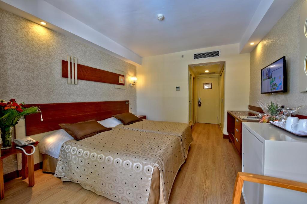 Postel nebo postele na pokoji v ubytování Side Star Beach Hotel - Ultra All Inclusive