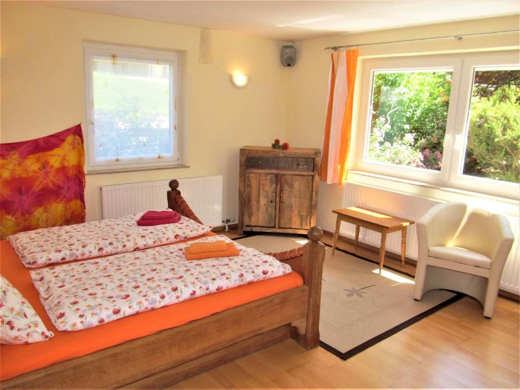 Postel nebo postele na pokoji v ubytování Gästehaus Horizont