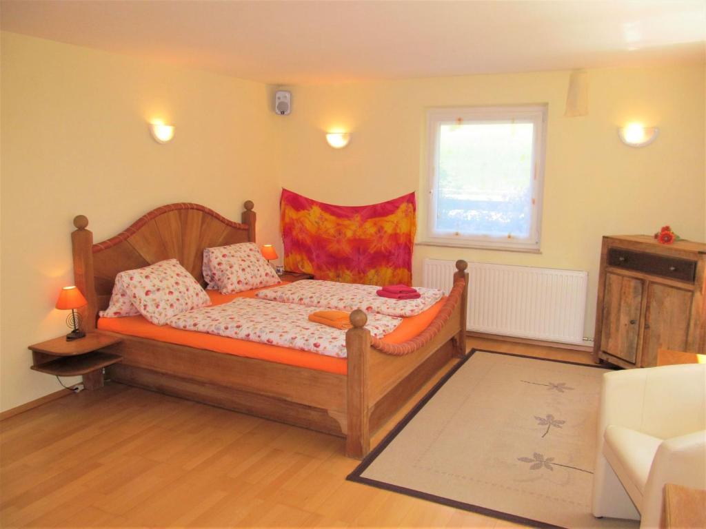 Postel nebo postele na pokoji v ubytování Gästehaus Horizont