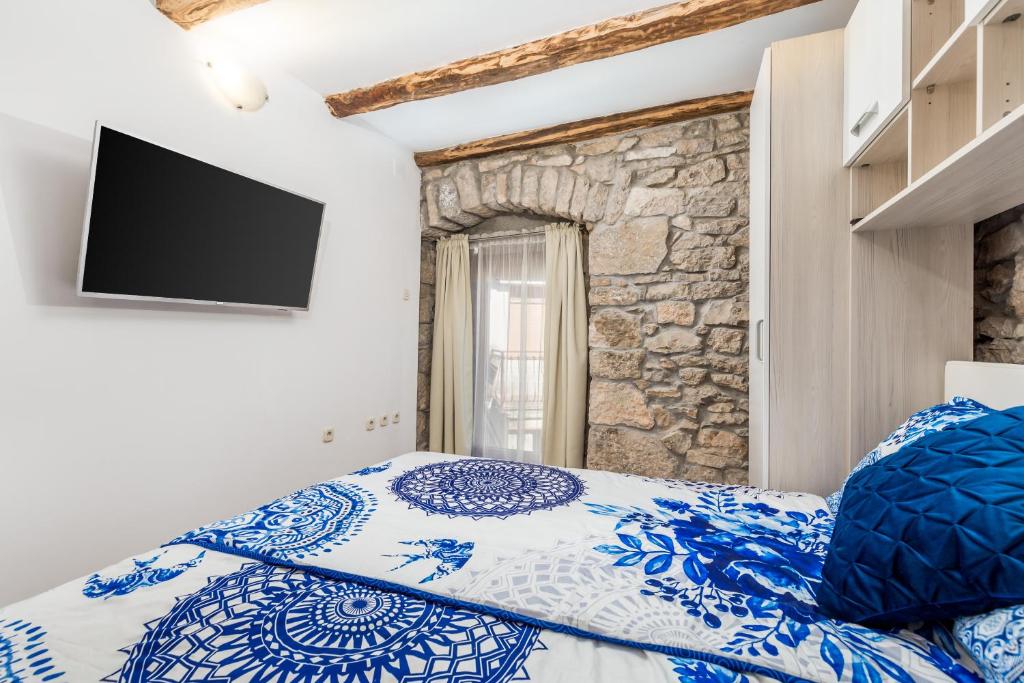 Cama ou camas em um quarto em Rural holiday home Stankolina Opatija