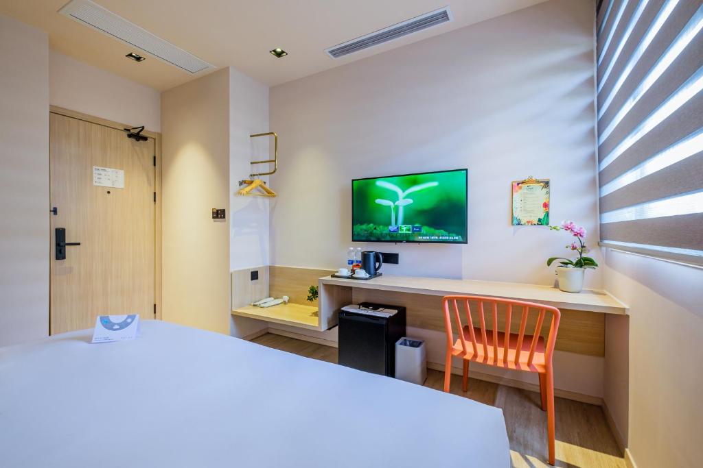 Телевізор і / або розважальний центр в PACE HOTEL Suzhou Guanqian Branch