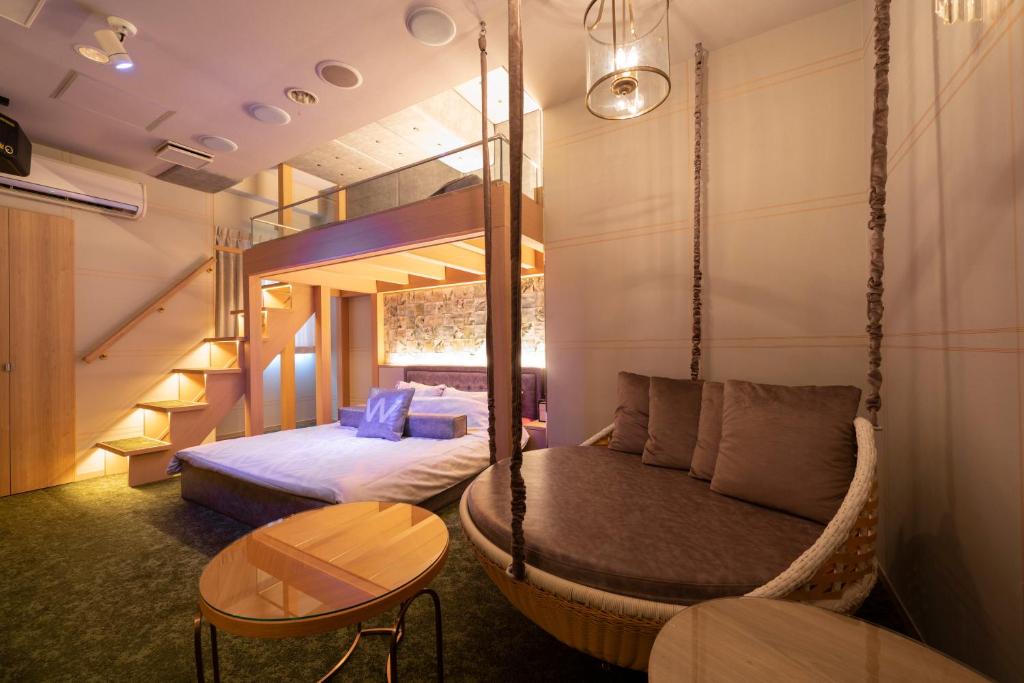 Postel nebo postele na pokoji v ubytování Design Hotel W Zip Club