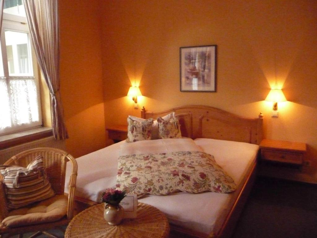 Postel nebo postele na pokoji v ubytování Hotel Am Grudenberg