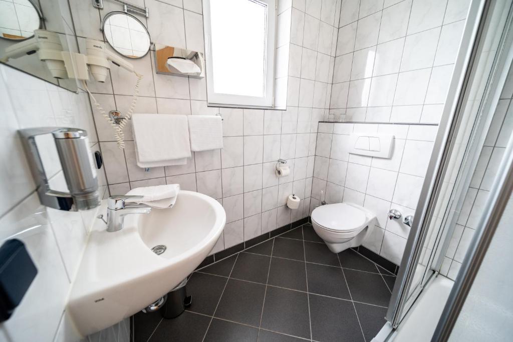 Koupelna v ubytování Hotel Rieder