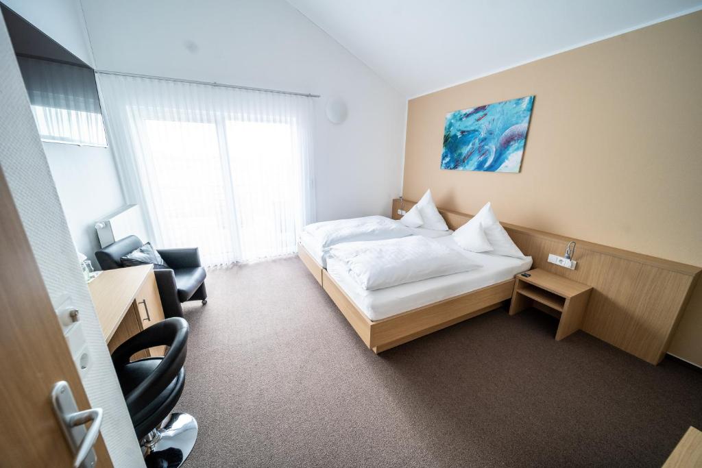 Postel nebo postele na pokoji v ubytování Hotel Rieder