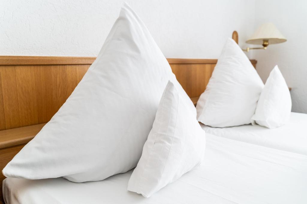 Postel nebo postele na pokoji v ubytování Hotel Rieder