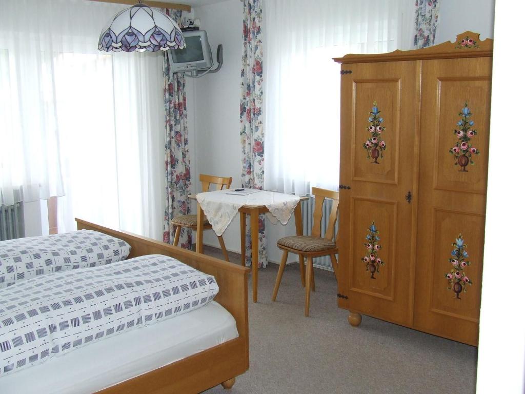 Postel nebo postele na pokoji v ubytování Pension Sonnenhof