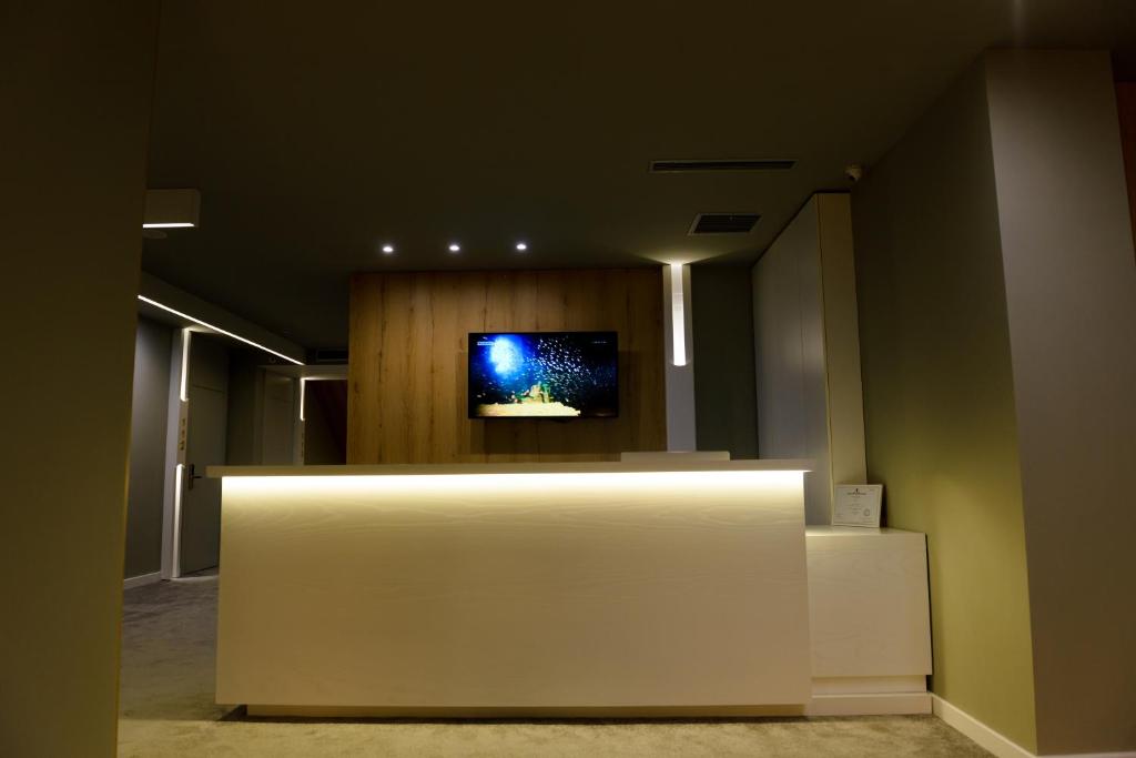 TV a/nebo společenská místnost v ubytování Hotel One