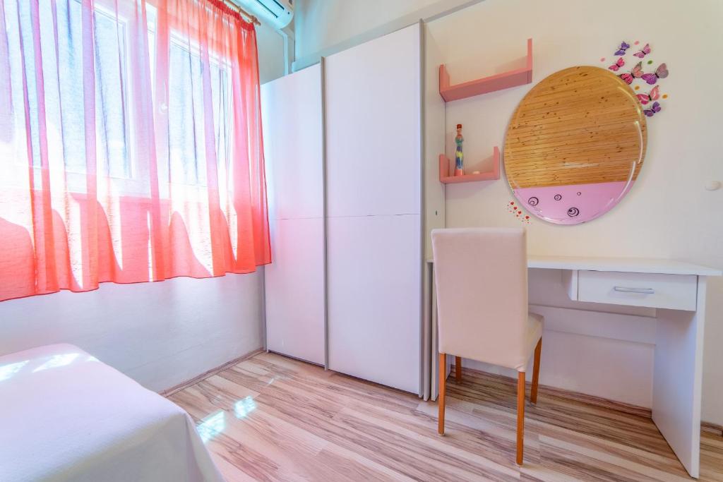 Postel nebo postele na pokoji v ubytování Holiday Home Tina