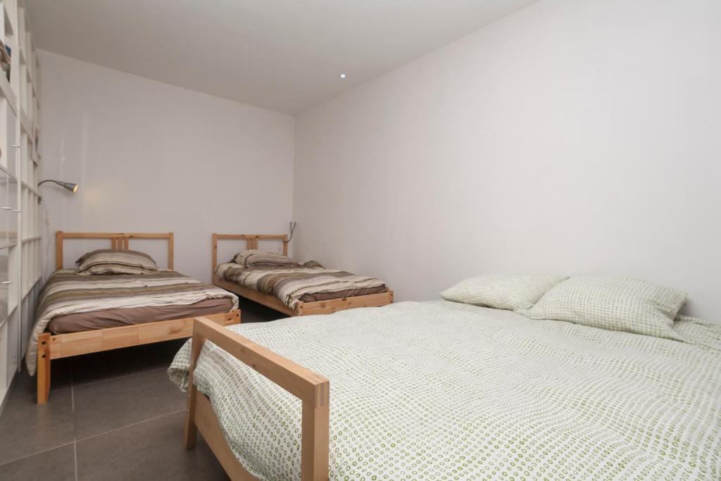 Postel nebo postele na pokoji v ubytování Atlanticvilla