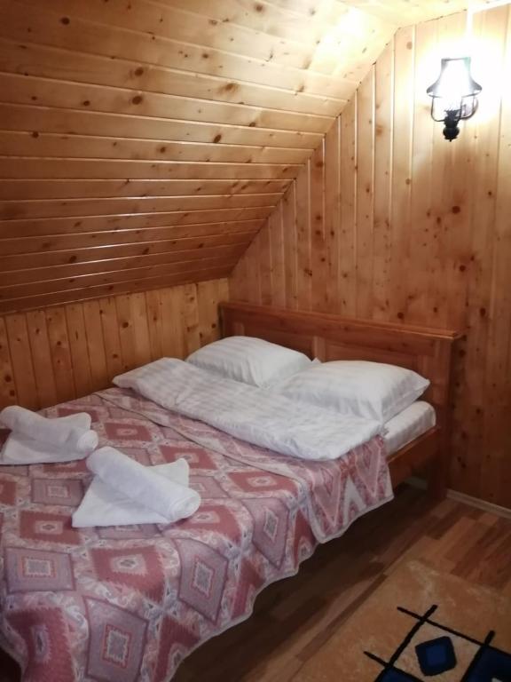 Postel nebo postele na pokoji v ubytování Deea Cascada