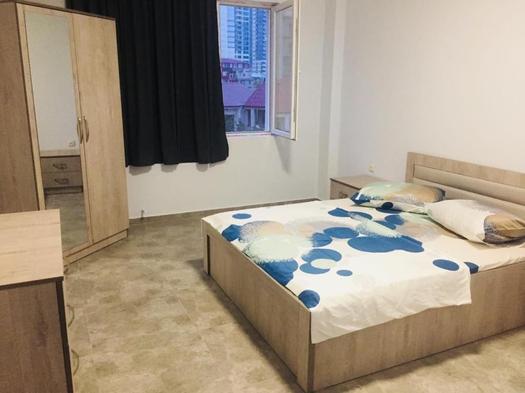 Postel nebo postele na pokoji v ubytování Batumi Hotel