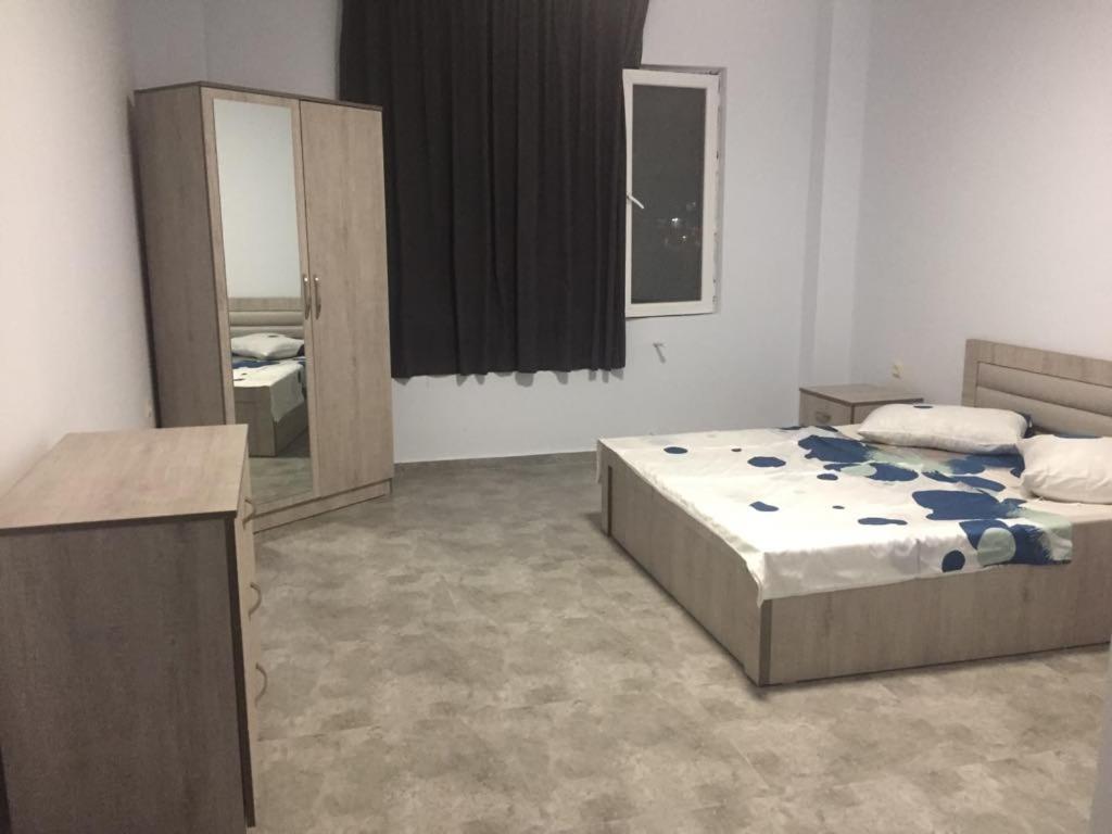 Postel nebo postele na pokoji v ubytování Batumi Hotel