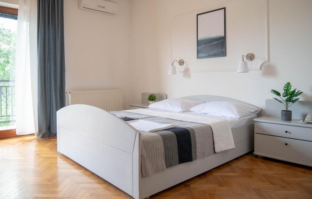 Posteľ alebo postele v izbe v ubytovaní Hotel Vienna