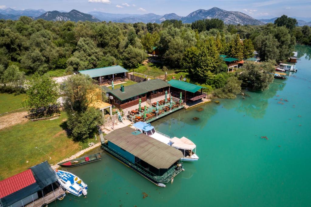 an aerial view of a resort on a lake at Apartments Obala in Podgorica
