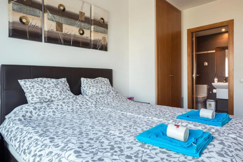 Posteľ alebo postele v izbe v ubytovaní Jie Apartment