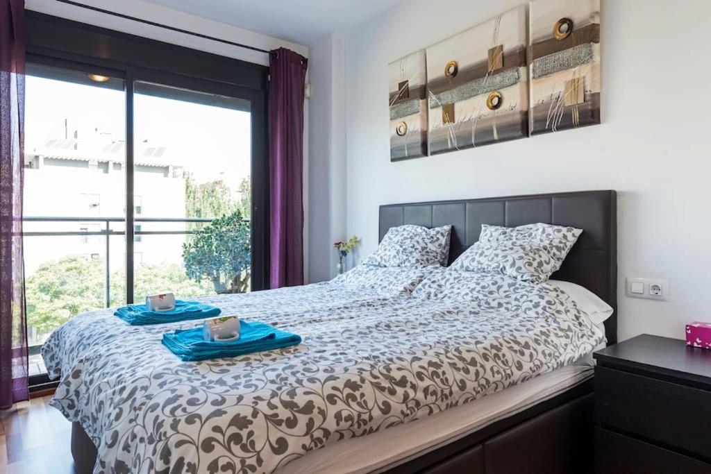 Posteľ alebo postele v izbe v ubytovaní Jie Apartment
