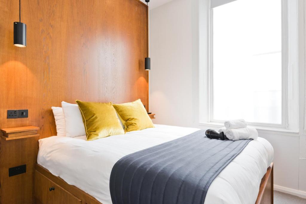 Postel nebo postele na pokoji v ubytování Templebar Rooms