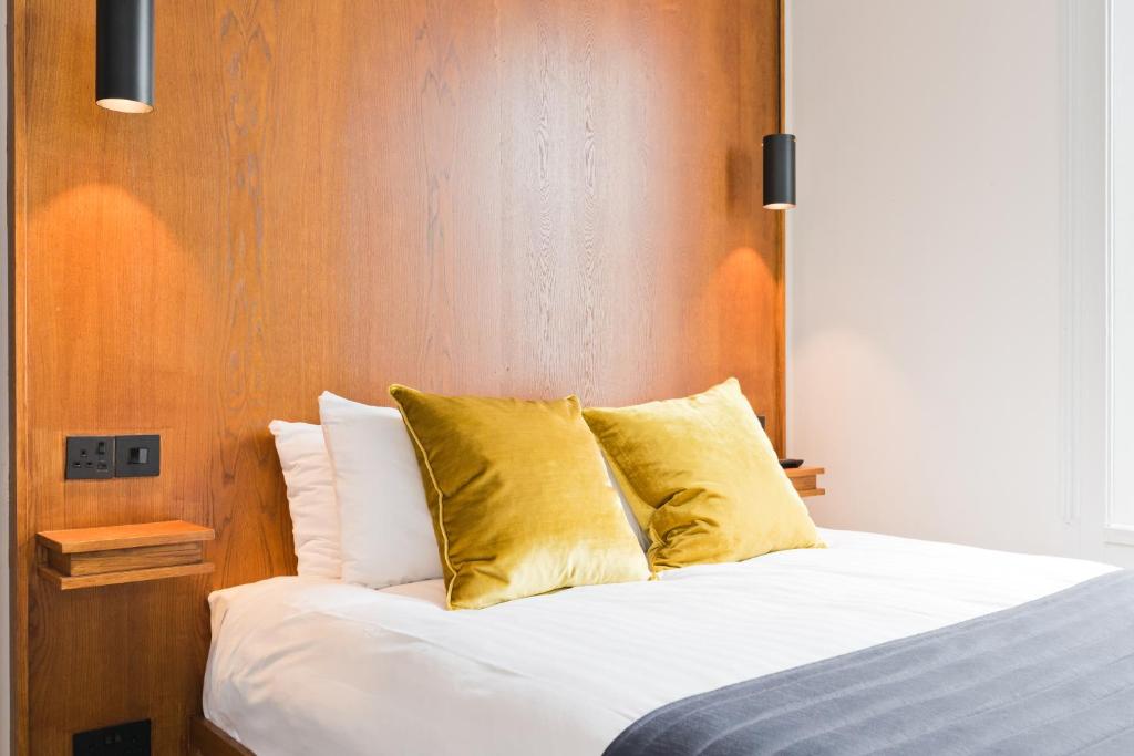 Postel nebo postele na pokoji v ubytování Templebar Rooms
