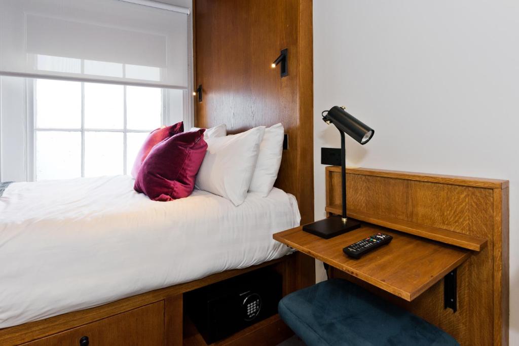 Postel nebo postele na pokoji v ubytování Templebar Rooms