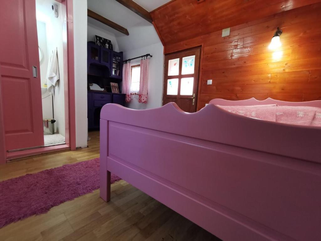 Postel nebo postele na pokoji v ubytování Etno Selo Rajski Konaci