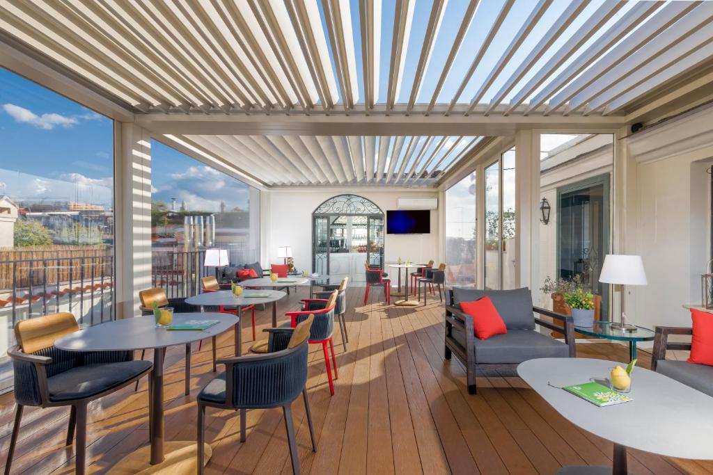 TV a/nebo společenská místnost v ubytování Hotel Nord Nuova Roma