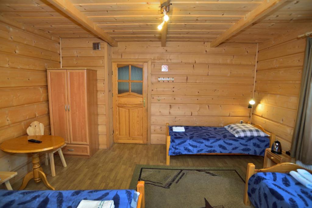 Postel nebo postele na pokoji v ubytování Pod Gorcami