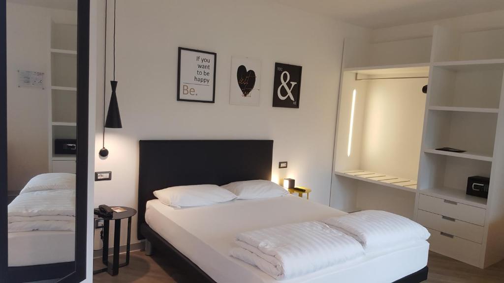Postel nebo postele na pokoji v ubytování Hotel Anna