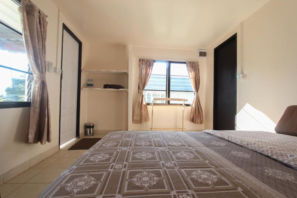 Postel nebo postele na pokoji v ubytování TK Beach Resort Koh Mak