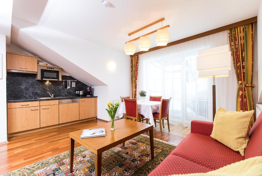 Kuchyň nebo kuchyňský kout v ubytování Hotel am See - Seeresidenz