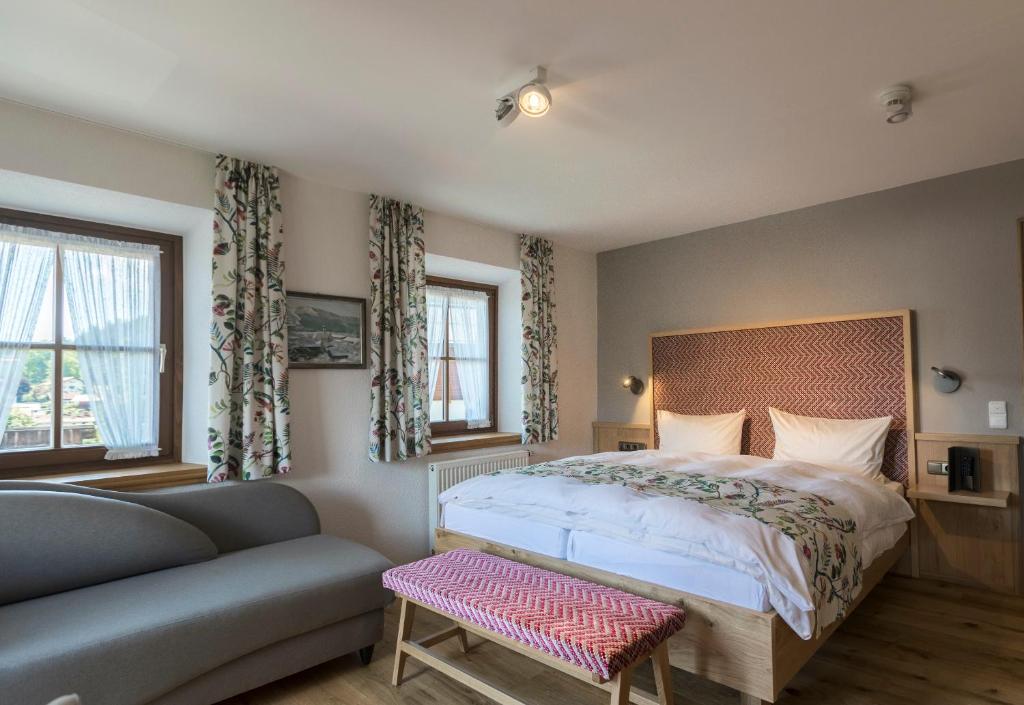 Postel nebo postele na pokoji v ubytování Hotel Oberschmied