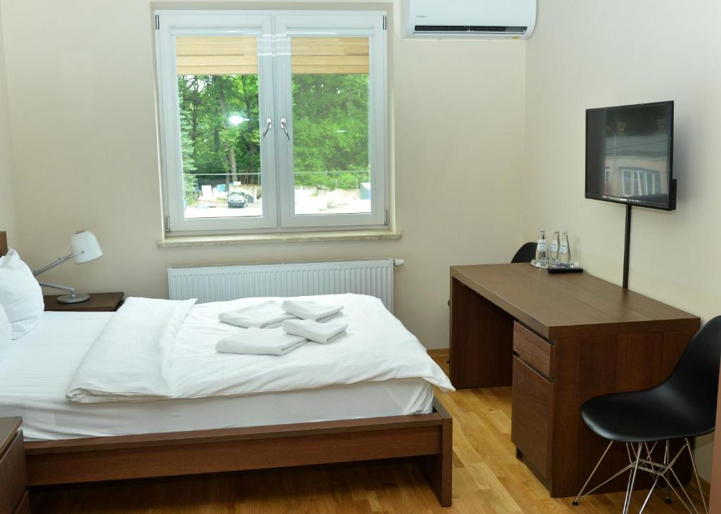 Postel nebo postele na pokoji v ubytování Brooklyn Noclegi