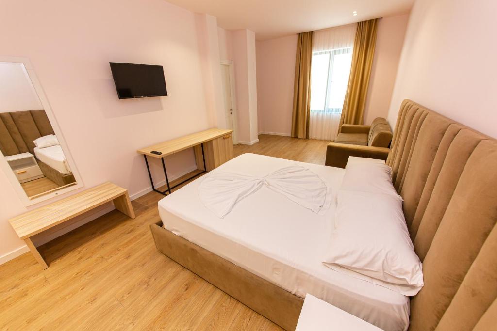 Postel nebo postele na pokoji v ubytování Hotel Alion